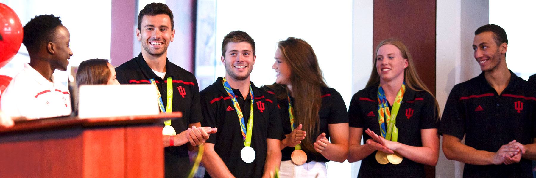 Student Olympic athletes at a reception